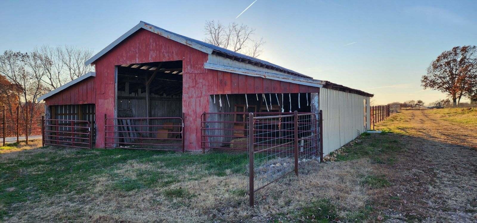 This property features paved road frontage, rural water, barn, pipe corral, view, pond, only 10 minutes from town. Most of pasture is hay field quality!