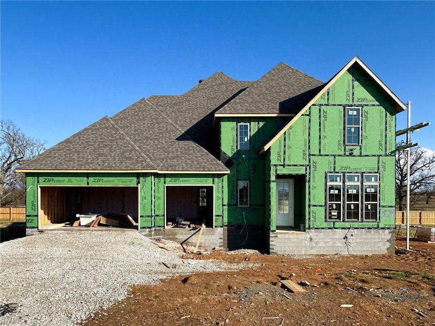 Welcome to County Line Square, a new Springdale community near Shaw Family Park with a pool and pavilion for residents. This home opens into the main living area, creating an inviting first impression. The living space features a fireplace and 3 large windows. From here, the layout flows into the dining area and kitchen, with French doors leading to the covered back patio. The kitchen includes a large island, quartz countertops, and cabinets to the ceiling. Engineered hardwood floors run throughout the first floor. A bedroom sits toward the back of the home with a full bathroom nearby. The primary suite features a vaulted ceiling, a bathroom with a double vanity and centered makeup vanity, a walk-in shower, and a walk-in closet that connects to the laundry room. A mudroom and 3-car garage are also located on the main level. Upstairs offers 3 bedrooms and a full bathroom. A fence, blinds, and gutters are included. Builder’s preferred lender is offering $3500 toward closing costs or a rate buy down. *Agent Owned*