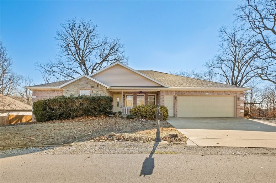 Prime Location! Drop in on the Rago trail right from your backyard or hit any of the other nearby trailheads. The Metfield Golf, Clubhouse, Fitness Center, Skills Park, and Basketball Courts are just minutes away. A Lake Brittany view is at the end of your street and Blowing Springs trails are only 3 miles away. This home's living spaces feature an open floor plan, making it ideal for entertaining or family gatherings. The living room has recessed lighting and a warm fireplace, which flows seamlessly into the kitchen with Corian countertops, an eat-in area with a built-in buffet, and a sitting space overlooking the pristine backyard through a wall of windows. Additional highlights include an enclosed sunroom, under-home workshop, large pantry, generous hallway storage and a dedicated office. The split floor plan features a primary suite with large bedroom, bath and dream closet. Recent updates include the roof-2020, geothermal Waterfurnace Heat Pump-2021, and water heater-2021. This home is ready for you!