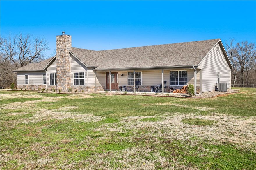 Prime piece of property just minutes from the Bella Vista Bypass, lake, golf course, and country! This spacious home includes countless upgrades such as engineered wood flooring, fully insulated garage with 8 person storm shelter, Sonos whole house music system with surround sound in the living room. Kitchen boasts an abundance of counter-top space and cabinets with large pantry that will accommodate any cook! Property accommodates livestock, hobby farming, large gardening and more!