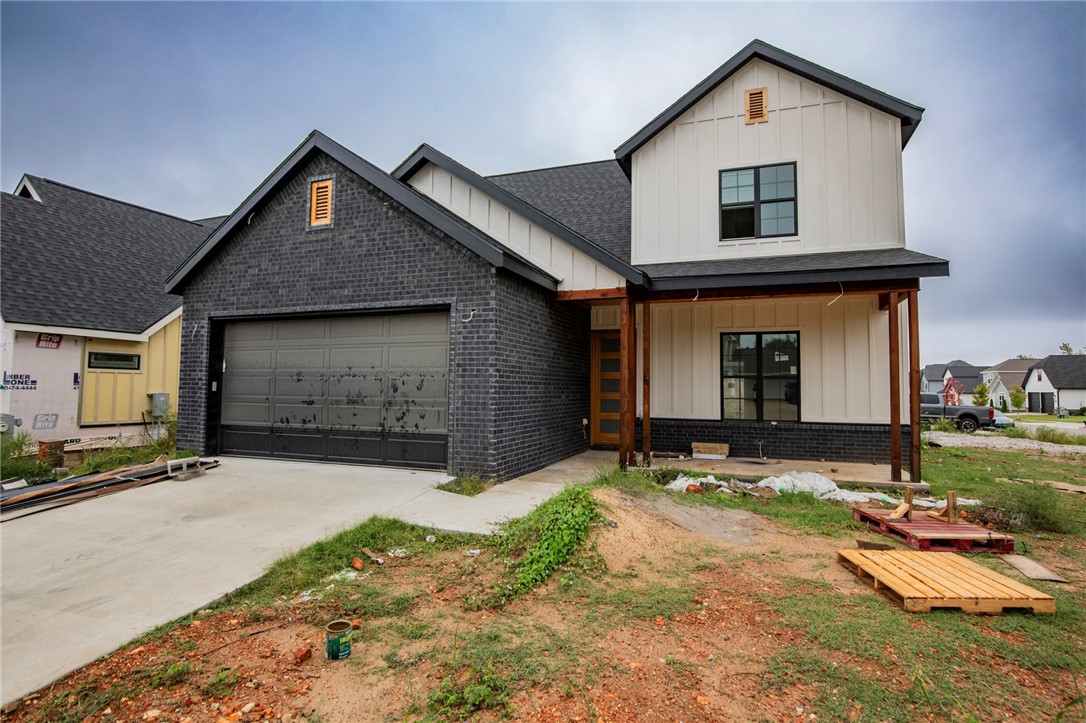 Fabulous new construction near the Promenade and Rogers Aquatic Center!
These elevated homes showcase stunning design with white oak flooring, high-end countertops, and designer tile selections throughout. Vaulted ceilings and floor-to-ceiling cabinetry create a grand, open feel, while the butler’s pantry, with counters and outlets, keeps your gorgeous kitchen clutter-free.
The primary suite is a true retreat, featuring a spa-like bath with a frameless glass shower wrapped in floor-to-ceiling tile, and dual vanities. The spacious walk-in closet offers custom shelving, drawers, and hanging space for ultimate organization. Upstairs, you’ll find three additional bedrooms and a full bath with the same elevated finishes, plus one room easily doubles as a bonus living area.
Outside, enjoy full sod, front landscaping, and a private backyard with a gate and wood privacy fence!