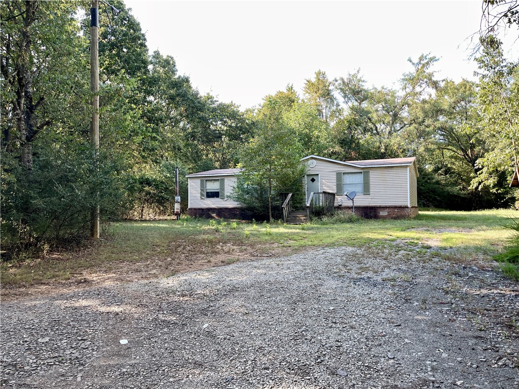 Looking for a quick fixer upper to make it your very own home. Maybe looking for you a place to fix & rent out? Whatever the case may be, make sure & take a look at this home that needs some love sitting on about 1.55 acres. Call & book your showing today.