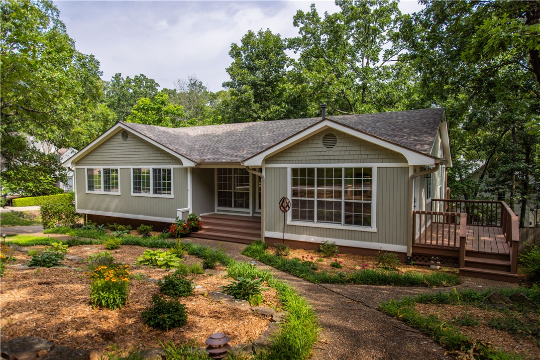 East Fayetteville home tucked in a quiet cul-de-sac just steps from Gulley Park & the Fayetteville Greenway! This updated 4BR/3BA, 2,588 Sq.Ft. home is move-in ready. Enjoy a light-filled family room with fireplace & sliding doors to a large porch. Features include dual master suites—one upstairs with private bath & two additional BRs, and a guest suite downstairs with en-suite bath. Bonus den with 2nd fireplace. Expansive porches overlook a landscaped, wooded double lot. Recent updates: new roof, gutters, skylights, interior/exterior paint, appliances, carpet, hardwoods & tile. Family-friendly neighborhood ideal for strolls & biking. Walk to Gulley Park’s playgrounds, green space & summer concerts. Just half a block from the Greenway Trail—perfect for walking, running & cycling. Includes 2-car garage, indoor storage, & extra parking pad. Schedule your showing today!