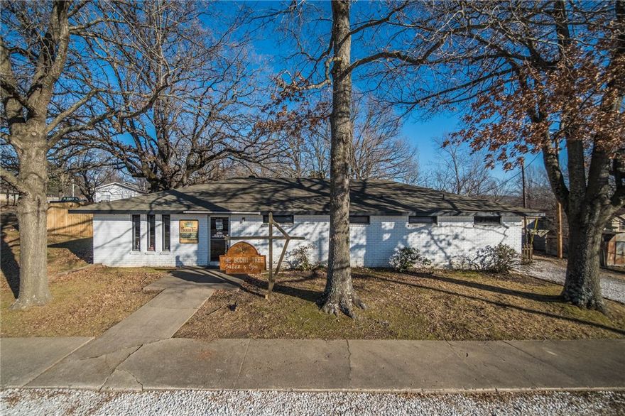 Just minutes from the U of A, this versatile building is currently leased as a salon and spa and includes seven private suites, a welcoming reception area, a break room, and one bathroom. The property is being sold with an adjacent 0.41-acre lot at 1929 Huntsville Road, offering expanded potential for parking, future development, or additional commercial use. Excellent visibility and location for a wide range of business ventures.