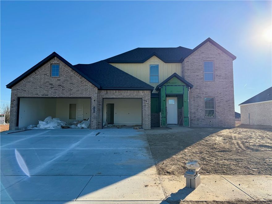 Located in Tontitown just off Highway 412, Bariloche offers a peaceful neighborhood atmosphere with the benefit of easy access to I-49, nearby schools, and a variety of entertainment and recreation.Welcome to the Olive Plan, offering 4 bedrooms, 2.5 bathrooms, and 2,386 heated square feet. This two-story home features an open living area, spacious kitchen, and dedicated dining space. The primary suite includes a soaking tub, walk-in shower, and large walk-in closet, with three additional bedrooms providing plenty of space for family or guests.Finishes include luxury vinyl plank flooring in the main living areas, tile in wet areas, and carpet in bedrooms and closets. A covered patio, 3-car garage, fenced backyard, gutters, and blinds make this home move-in ready.