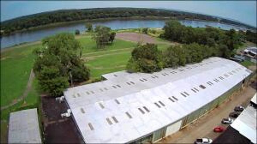 This is a rare find on the Arkansas River with 11 acres and 52,000 plus sq ft building. Sq footage includes 38,196 warehouse space with dirt floor and the remainder could be used for retail or any other commercial endeavors you would like to pursue. The possibilities are endless.