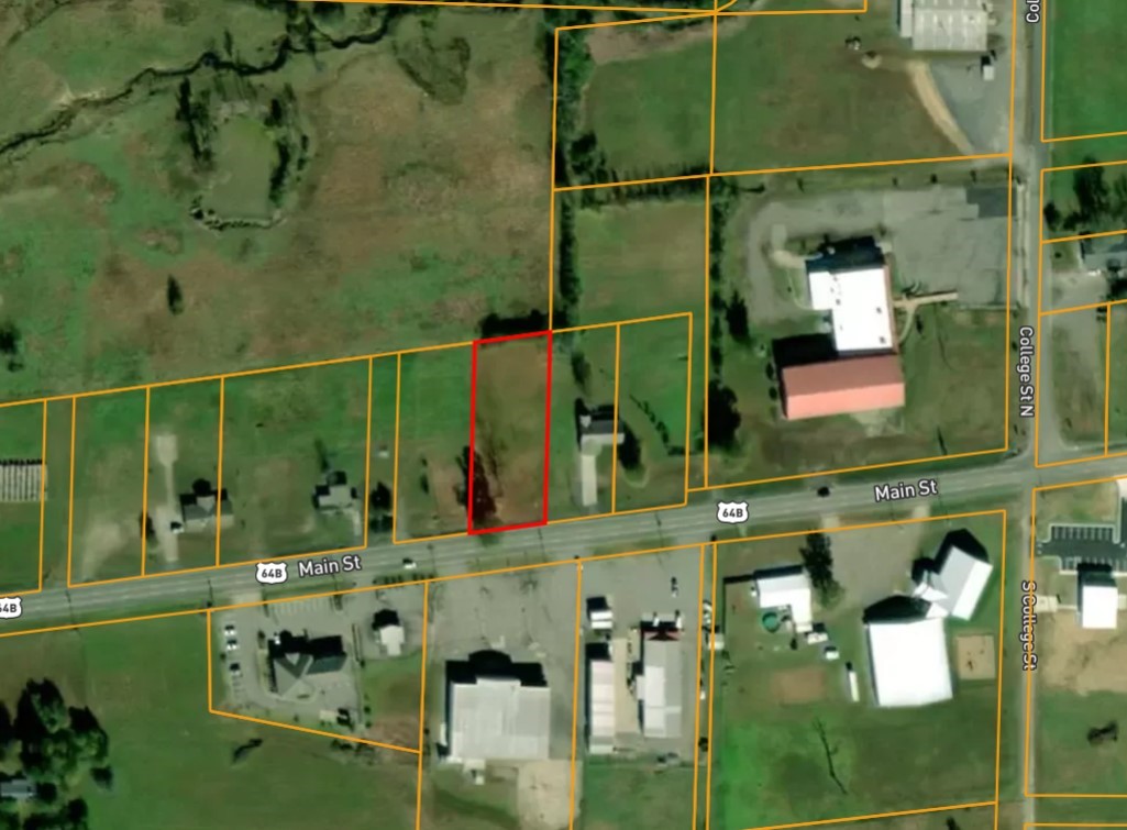 Excellent opportunity to build residential or commercial on this centrally located lot in Vilonia. Property features utilities on site (water, electric) plus an existing storm cellar and paved driveway for added convenience. Zoned C-1 and residential, allowing for a wide range of development options. Located on Main Street with great visibility and access. Ready for your next home, business, or investment project!