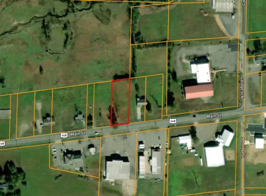 Excellent opportunity to build residential or commercial on this centrally located lot in Vilonia. Property features utilities on site (water, electric) plus an existing storm cellar and paved driveway for added convenience. Zoned C-1 and residential, allowing for a wide range of development options. Located on Main Street with great visibility and access. Ready for your next home, business, or investment project!