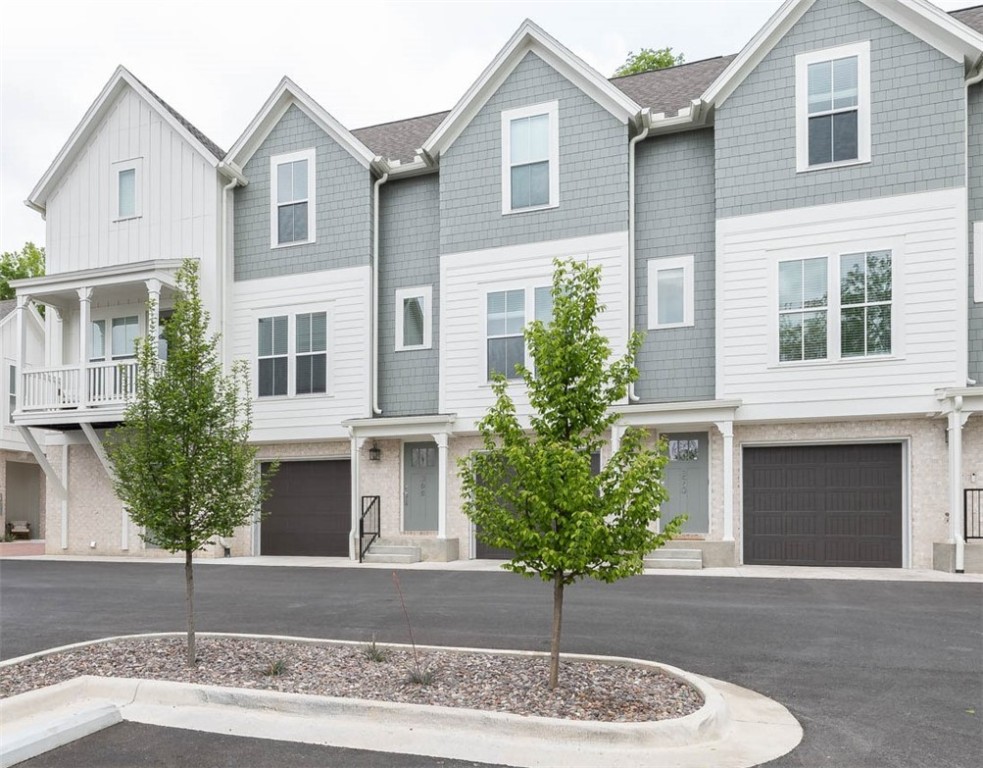Wonderful opportunity to live 0.5 miles from the University of Arkansasās campus! 1,215 heated sq ft offers 2 bedrooms, 2 full baths, open eat in kitchen to living, and separate laundry. Other amenities include quartz countertops, stainless steel appliance package, painted cabinetry, luxury vinyl plank flooring, washer, dryer, refrigerator, 2ā faux wood blinds, a perfect private balcony with composite decking, and a 1 car garage on the main level!