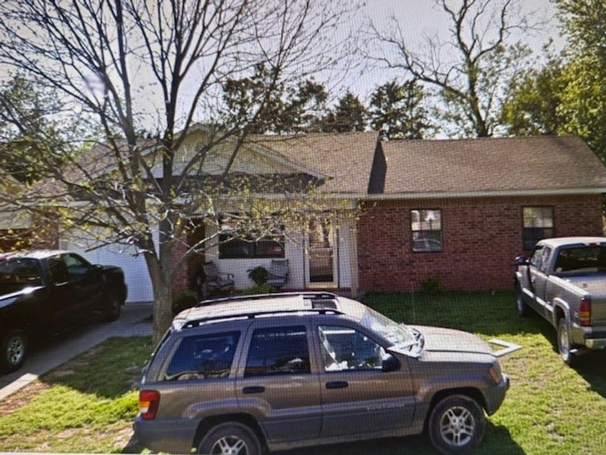 3 bedroom, 1 bath house with garage and fenced yard.