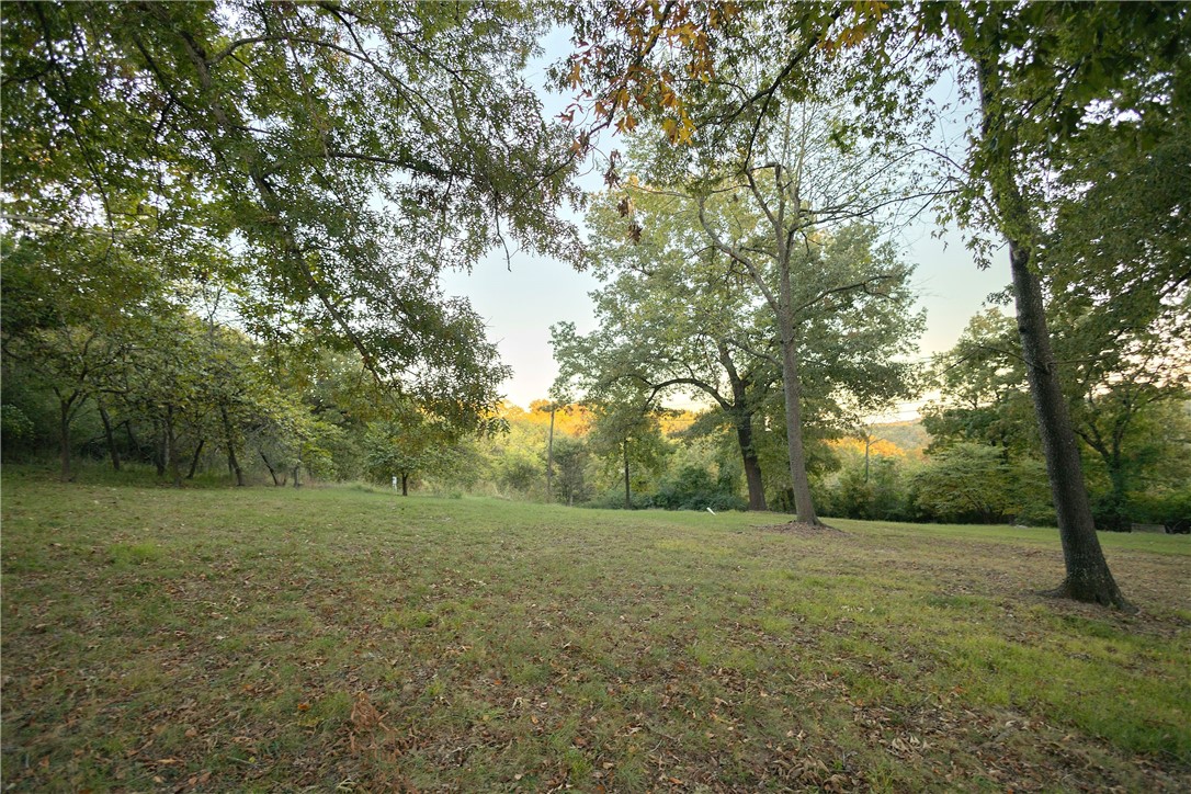 COTTER LOTS! Build your DREAM home on 3 beautiful acres of prime real estate in the charming and historic town of Cotter, AR! The property is comprised of 42 lots offering multiple building sites for your new home . . . or develop with multiple residential homes or VRBOs. The property is less than one mile from a public boat launch to the FAMOUS White River, teeming with trout and natural beauty. Enjoy walks to the Big Springs Park and iconic Cotter Bridge only minutes away! Utilities available on property line. Property begins on Sixth Street between Dalton Ave and Combs Ave. The possibilities are endless. Call for more information to make this property in vibrant Cotter yours!!!