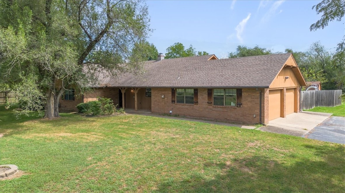Ranch style home on 2 serene acres of land with a huge flat yard, mature trees, and covered front porch. Outside you will also find a fenced back yard, huge, covered pavilion/bar, and private in-ground pool with diving board and slide. Inside you will find updated LVP flooring, new light fixtures, freshly painted trim, and some remodeled bathroom areas. Other amenities are double oven, oversized bedrooms with walk-in closets, and an office space. The main suite has two closets with one that is cedar lined. The home is in an estate, sold as-is, and subject to court approval.