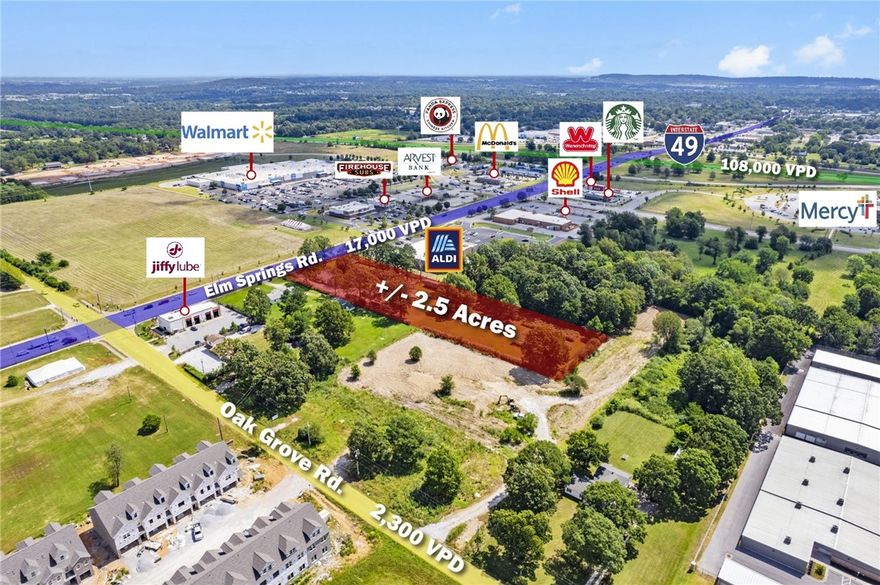Prime development opportunity on +/- 2.5 acres of level land right off Elm Springs Rd, which sees around 17,000 VPD! This piece of land is strategically located near one of the busiest Walmart Supercenters, considered a "Test Store" and just a half mile from I-49, which sees around 108,000 VPD. Surrounded by excellent neighboring businesses, including, Aldi, Arvest Bank, Jiffy Lube, Firehouse Subs, Starbucks, Shell Gas Station and more. These business help provide a solid local demographic and potential customer base. Currently zoned A-1, offering flexibility for various development possibilities. Don't miss out on this ideal site for your next project!