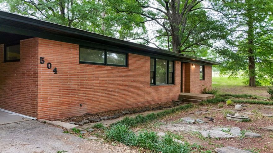 Midcentury modern dream home situated on a spacious .62 (+/-) acre lot! This move-in ready property features an open and inviting layout with tasteful updates throughout. The kitchen has been opened up to make it perfect for entertaining with brand-new appliances and modern finishes. A custom-built mudroom adds functionality, offering the perfect drop zone for everyday living. This home also provides major storage and flex space perfect for collectors or crafters of any sort. Enjoy relaxing year-round on the screened-in back porch overlooking the large backyard with plenty of room to play, garden, or entertain. Combining comfort, style, and space, this home is ready for its next owner to enjoy!