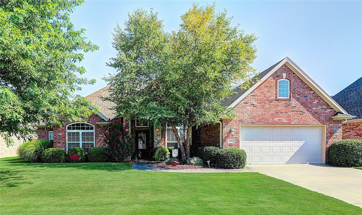 Immaculate family home with 4 bedrooms, formal dining, stainless appliances, granite counters and wood flooring. 2129 square feet, 2-car garage. This home is close to Promenade Mall and Razorback walking/bike Greenway. Outstanding home to entertain family and friends. Nice master suite with walk-in closet a walk-in shower and Jacuzzi bath. Professionally landscape yard.