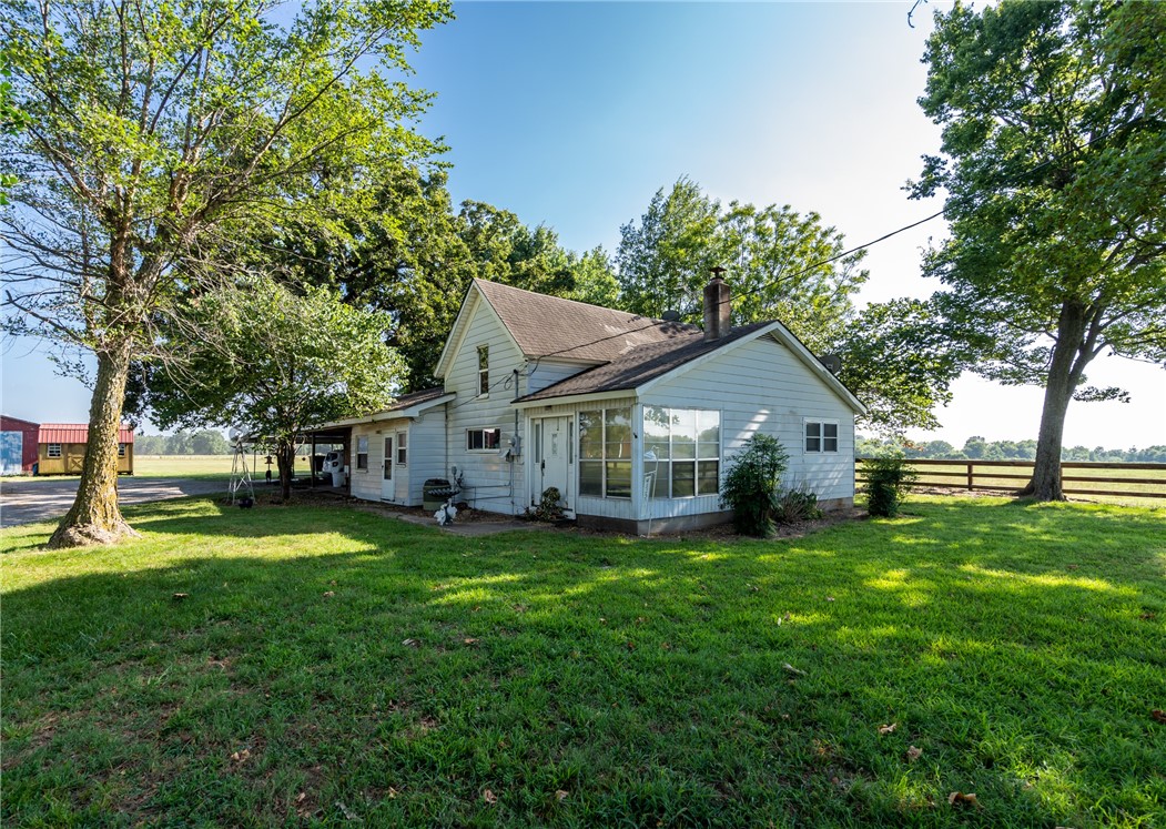Dpn't miss your chance to buy this working cattle farm. 3bed 2 bath home on 57.92 acres on Hwy 72 and Benson rd. Great farm to run cattle or build poultry house's on. Large workshops and machinery sheds included. House needs a little TLC. Call me for a showing today. Small storage building does not convey. House being Sold AS IS!