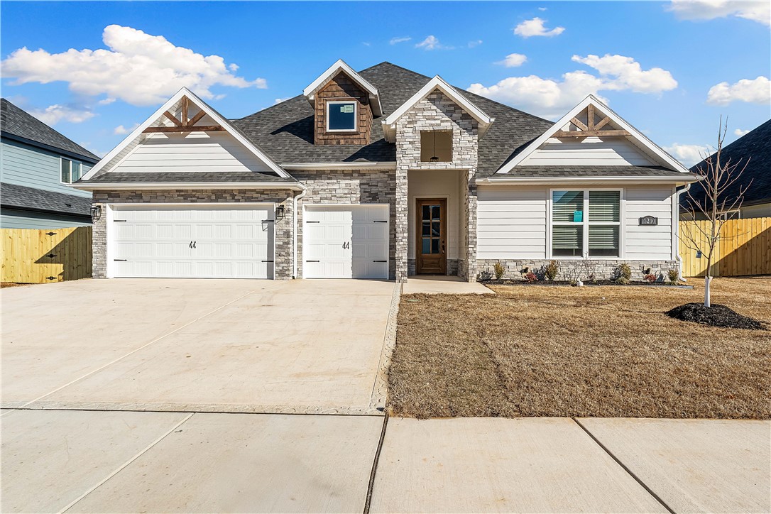 Welcome to Maple Estates in Centerton, Arkansas, a community that offers both comfort and convenience. Located just 6 miles from downtown Bentonville, it's close to schools, shopping, and entertainment. Residents enjoy community amenities like a clubhouse and a pool, perfect for relaxation and recreation.The Brook plan boasts 2,544 sq. ft. on a 0.21-acre lot, thoughtfully designed to maximize space. It features 4 bedrooms, 3 bathrooms, and a 3-car garage. The open-concept living areas, vaulted ceilings in the living room, and a covered patio with a fireplace make this home ideal for gathering. Additionally, there's unheated storage off the back patio for extra space. Additional concessions include $7,500 in closing costs from the builder and up to $5,000 from a preferred lender.