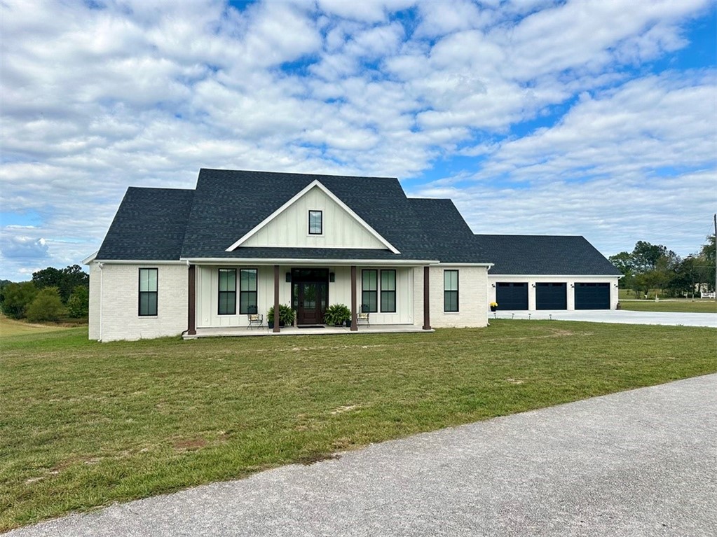 Custom built home on 1.61 acres completed in 2023 north of Harrison in a highly sought after subdivision, North Ridge Estates. The property features luxury and well thought out details at every turn! The 3 BR 2.5 BA main house has luxury plank flooring, 10 ft ceilings, leathered granite and quartz tops in the dream kitchen, an induction oven that bakes, steams, airfries and more! The LP smart siding, spray foam insulation, noise reduction wall insulation, extra makeup vanity for the lady of the home and fiber optic internet are sure to be loved! There are 5 garage spaces total. The detached garage has 3 spaces, is extra deep for boats, trailers, multiple cars and a workshop. The detached garage also features heat, air, recessed LED lighting, half bath and plenty of electrical outlets. Upstairs you have a huge bonus room space that has a full bath and enough room to make it a mother-in-law space, 4th BR, office, etc. Sure to please the buyers that are looking for top of the line luxury, quality finishes and features