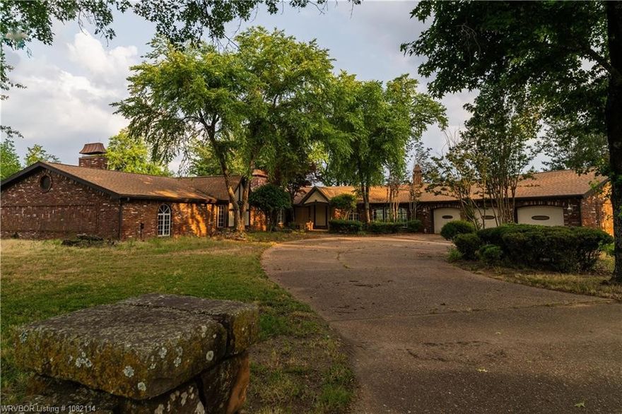 Welcome to 3655 Beach Way in Van Buren, AR- a rare and remarkable estate set on 112+/- acres of beautiful cross-fenced pastureland only minutes from town. With more than 5,900 sqft of living space, this custom home features 3 bedrooms, 3.5 bathrooms, and an attached 3-car garage. The property boasts a private in-ground pool, 3 ponds, multiple barns, large workshop, horse stables, and a covered training arena- all framed by sweeping scenic views. Whether you're dreaming of a sustainable lifestyle or an expansive working ranch, this property offers endless possibilities. There is ample space to grow vegetables, raise cattle, train horses, and fully embrace the farming or ranch life. A perfect blend of luxury, functionality, and freedom-this is country living at its finest.