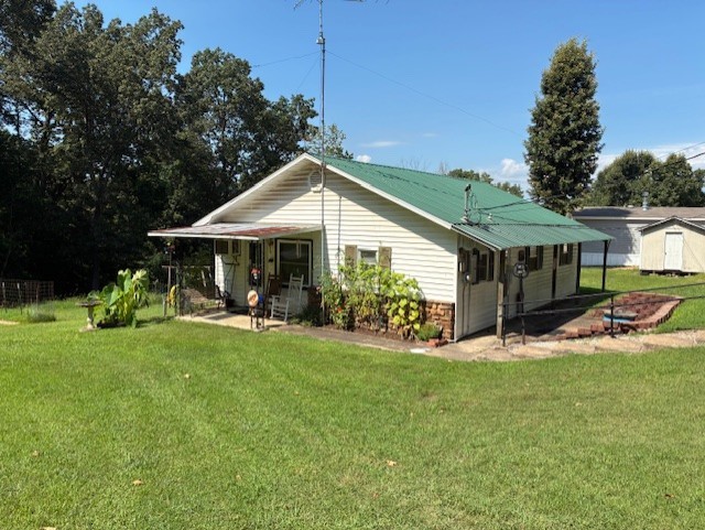 Are you looking for a property that's in town but feels like it's in the country? Make this one your own and enjoy the 10 x 14 shop, 10 x 20 carport and the 12 x 26 shop/carport all on 2.5 acres. The family has owned this home since 1973 and has taken great care of it. This 3B, 1B home is cozy and homey - add a little bit of paint and TLC and this would be a showplace!