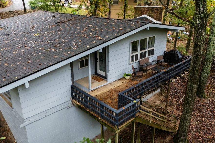 A beautifully updated home on a quiet cul-de-sac in the heart of Bella Vista. Enjoy easy access to bike trails, golf courses, lakes, and all the amenities this vibrant community has to offer. Step inside and you’ll find 1,015 sq. ft. of move-in ready living space, featuring a spacious living area with a stunning stone wood-burning fireplace, perfect for cozy evenings. The home was completely remodeled just four years ago, with new Sheetrock, cabinets, fixtures, and flooring throughout. The large back deck offers an ideal outdoor retreat, perfect for relaxing and taking in the beautiful natural surroundings. The low-maintenance yard means more time to enjoy the Bella Vista lifestyle, while the spacious under-house storage offers excellent potential for a workshop or hobby area.   The home has been refreshed both inside and out, ensuring a seamless transition for its next owner.
Don’t miss this move-in-ready gem where comfort, convenience, and outdoor adventure come together in perfect harmony!