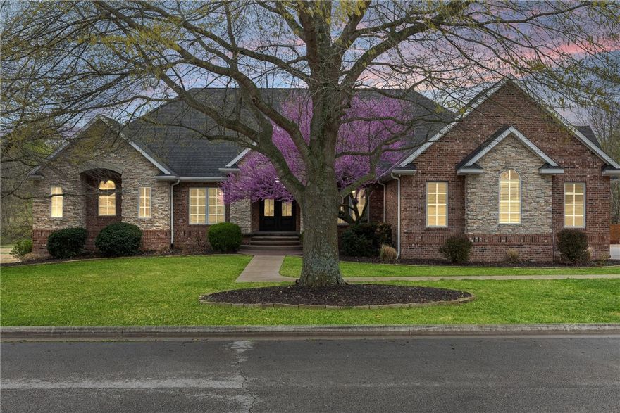 Truly a must-see! Spanning 7,497 sqft (7 bdrm, 7 bath) w/ a 4-car garage on 2 acres backing up to a creek in one of Fayetteville's premier gated communities. Short 6-min drive to shopping & Fayetteville schools! Luxurious primary suite features sitting area w/2-way fireplace & a show-stopping, fully remodeled bathroom & custom walk-in closet. Multiple indoor & outdoor entertaining areas. Kitchen includes dual-function chefs oven, bar sink in island, granite, bar seating, & eat-in leading to sun-filled hearth room. Amazing LL is perfect to host guests for short or long term. HUGE media/game room, large landing opens to in-ground saltwater pool, hot tub (conveys) & fire pit area. Self-contained 2 bed, 2 bath apt w/ own full kitchen, dining, & living room. Perfect for multi-generational living, college students, or MIL suite. 4 car garage includes EV charger, epoxy floors, insulated doors, custom cabinets, & mini-split for comfort. Irrigation, central vac, invisible fence. See complete list of upgrades & improvements.
