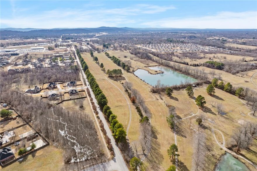 Exceptional commercial development opportunity, in one of Fayetteville’s most desirable growth corridors, is conveniently placed between I-49 and Hwy 112, with high visibility, easy access to major roadways, and proximity to growing residential and business communities -  ideal for a variety of commercial uses. With flexible parcel sizes and multiple development possibilities, this site is perfect for business expansion, investor portfolios, and commercial developers looking for their next big project. Zoned Mixed-use – Approved for retail, office, restaurant and housing development. City water, sewer, and electric available. Key Highlights include its strategic location providing excellent regional access. High-growth area  surrounded by expanding residential and commercial developments. Ideal for retail centers, office buildings, restaurants, or mixed-use. Ready for development with access to essential infrastructure.