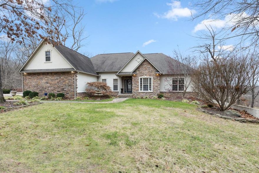 Experience sheer luxury on 5+ acres with a picturesque setting. This renovated custom-built home offers 5 beds, 3 baths, a dream kitchen, an inviting in-ground pool with a hot tub, and a safe room. Perfect for entertaining, the property features extra spaces, including an expansive outdoor living area and a sizable 40x80 shop with living accommodations. From the charming circle drive to the enchanting waterfall entrance, every detail is exquisite. This 4500 sq ft home is the epitome of perfection, delivering all you could ever desire.