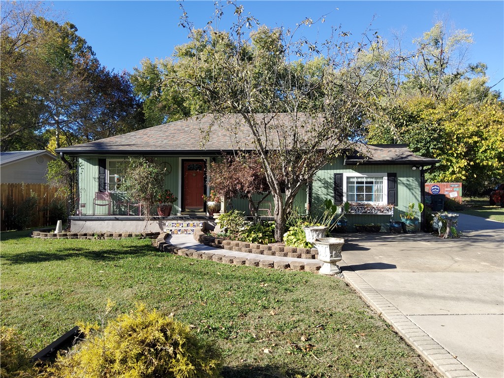 Looking for that perfect Investment Property, Or a place to call your forever home? Check out this well-maintained 1940’s Bungalow located in S.E. Fayetteville Zoned C2. Make this charming place your home, a business, long term/short term rental, Airbnb, VRBO, office space, salon, retail space. Lots of potential in a fast-growing area of Fayetteville. This home features: charming front porch, original wood floors, large fenced in back yard and deck for entertaining, spacious floor plan w/ seamless living and dining area, open to bar area and updated kitchen w/ SS appliances. Generously sized bedrooms and a large remodeled spa styled bathroom with ample built in storage. New roof in 2020, new AC in 2022, bathroom and kitchen were updated in 2018. Schedule a showing today!