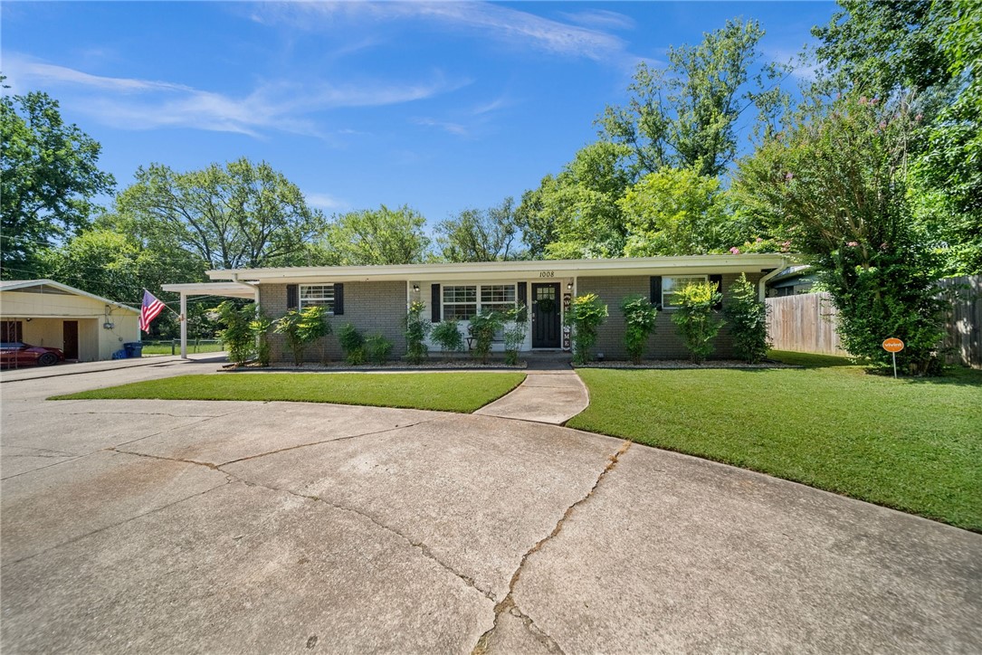 Seller offering $2,300 in paid closing costs if closed by 9/1! Cute as can be home nestled in the heart of NWA's Hallmark-esque town of Siloam Springs. Updated with modern, low maintenance finishes, this turn-key all brick home has 3 bedrooms & 2 bathrooms. Kitchen includes newer cabinets, granite counters, & stainless steel appliances. Updates don't stop there- the home has newer vinyl windows, new flooring throughout (no carpet in the home!), newer gas water heater & newer HVAC system! A brand new metal roof will be installed soon. Step outside to the spacious fully fenced backyard-- perfect for a firepit, small garden, and furry friends. Each bathroom has been updated with newer vanities bathtubs, toilets, and hardware. You'll love the natural light in the living room, as well as the built-in storage & cedar lined closet. You'll appreciate the circular drive, covered parking space, as well as an additional side parking spot. Location can't be beat-- approx 1 mile to Sager Creek Trail & John Brown University.
