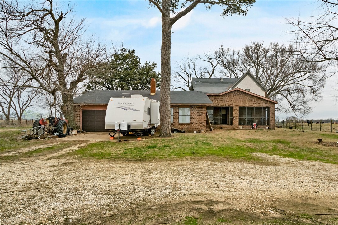 *** WILL SUBDIVIDE AND POSSIBLY SELL LAND WITH NO HOUSE OR WITH A HOUSE **Very hard to find beautiful 57 ac mol (approximately) acres with a very large house 2944 SF (per courthouse records), the house has had additions over the years and is capable of being like a mother-in-law quarter under the same roof. The house has had some recent remodeling, but it can use some more of your own remodeling. Has HVAC, propane heat, 1 well, 3 ponds, propane (gas), 4 or 5 bedrooms (depends on what a person did) and 2 bathrooms. Great development opportunity or maybe build chicken houses?