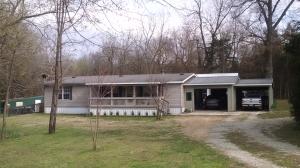 Perfect! That's the best way to describe this great property nestled on 3 serene acres. 3 bed, 2 bath, 2 car garage home sits quietly back in the trees. Workshop, Seasonal/mud room. Whether relaxing on the covered porch or strolling thru your own orchard, this property has more than enough room for all your favorite pastimes. A MUST SEE! Call today for showings.
