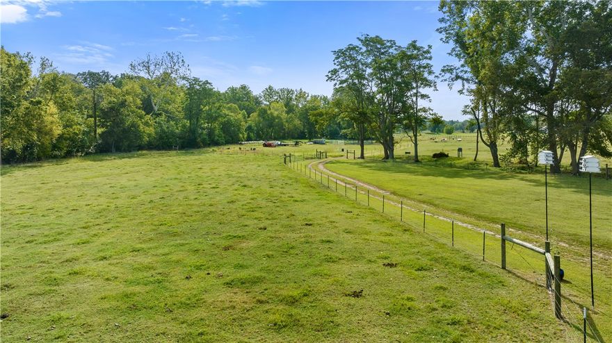Development opportunity just west of XNA! If purchased separately, code allows this property to have up to 30 homes built with a single egress. Buyer to verify with City of Highfill.

This property along with the adjoining property offer a total of 58.37 acres. Both properties combined offer road frontage on Center Street and Cowan Road to allow two points of egress. With electric, water, and sewer connections already in place on this listing, it's ready for you to transform. Sewer capacity upgrades are in progress and are expected to be complete within the next 2-3 months. Located 5 minutes from a new restaurant, brewery, food truck park, XNA, and the rapidly expanding amenities of Highfill. This property is surrounded by large estates, offering both seclusion and increasing value. The proximity to the new 612 connector adds incredible access to all of NWA.
