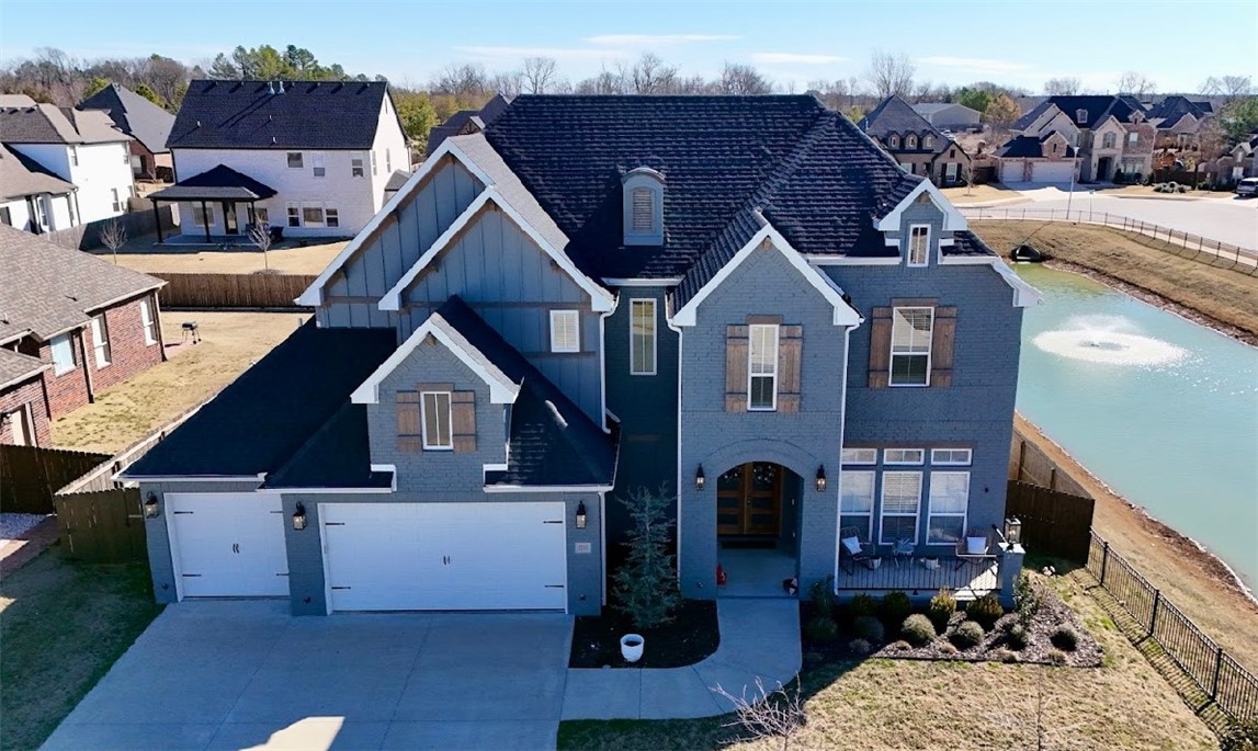 Welcome to this exquisite 5bed/4bath home, where luxury meets comfort in a highly desirable neighborhood, mins from shopping, dining & entertainment! As you enter through the double front doors, you’re greeted by a cathedral ceiling with a 10ft spiral chandelier, wine storage & humidor leading to the open floor plan that is bathed in natural light. Enjoy a seamless transition from the living room to the designer kitchen w/Cambria quartz & walk-in pantry. The sunny breakfast nook connects effortlessly to an outdoor patio & fireplace, offering a serene view of the custom-built heated pool. Off of the foyer is a bedroom that can easily serve as a study. The owner's suite flows into a spa-like bath with a freestanding tub & a shower featuring a raincan & body sprayers, providing ultimate relaxation before entering the walk-in closet. The 3-car garage leads to the laundry & upstairs you'll find a game room with a dry bar, 3 beds & 2 baths. The space is complemented by a catwalk that overlooks the grand 2-story entrance.