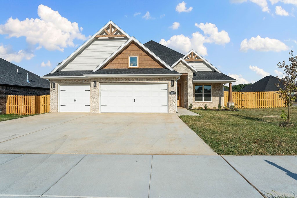 Welcome to the Jennifer Plan!This beautiful 2,696 sq. ft. home features 4 spacious bedrooms and 3.5 bathrooms, ideally located next to Pea Ridge Schools.Step into a bright and inviting living room with vaulted ceilings and an open-concept layout that flows seamlessly into the kitchen. The kitchen includes a walk-in pantry and a cozy breakfast nook, perfect for casual dining.The primary suite is thoughtfully designed to offer privacy, featuring direct access from the master closet to the utility room giving you both convenience and seclusion. Also located on the main floor is a secondary bedroom, ideal for guests or a home office.Upstairs, you'll find two additional bedrooms with a shared full bathroom, providing plenty of space for family or visitors.Additional highlights include a 3-car garage and covered front and back patios perfect for relaxing or entertaining outdoors.