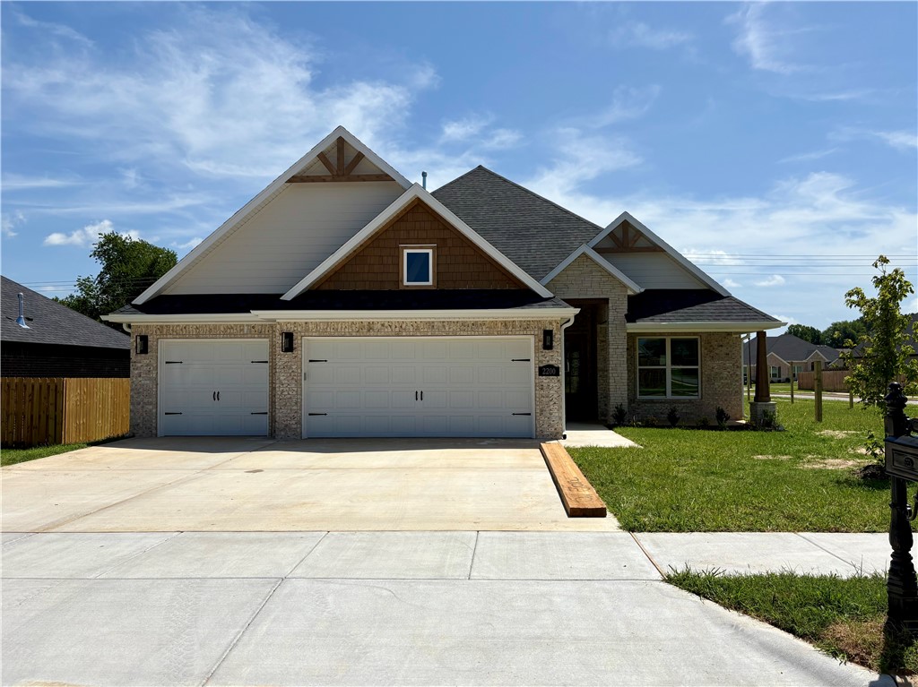 Welcome to the Jennifer Plan!This beautiful 2,696 sq. ft. home features 4 spacious bedrooms and 3.5 bathrooms, ideally located next to Pea Ridge Schools.Step into a bright and inviting living room with vaulted ceilings and an open-concept layout that flows seamlessly into the kitchen. The kitchen includes a walk-in pantry and a cozy breakfast nook, perfect for casual dining.The primary suite is thoughtfully designed to offer privacy, featuring direct access from the master closet to the utility room giving you both convenience and seclusion. Also located on the main floor is a secondary bedroom, ideal for guests or a home office.Upstairs, you'll find two additional bedrooms with a shared full bathroom, providing plenty of space for family or visitors.Additional highlights include a 3-car garage and covered front and back patios perfect for relaxing or entertaining outdoors.