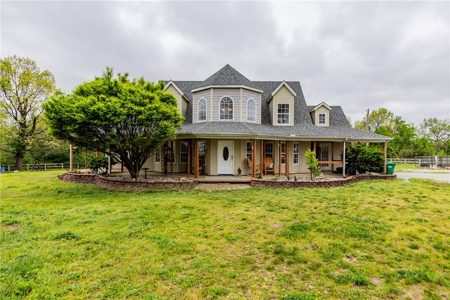 Horses are in the back fenced area for showings. Barn conveys with acceptable offer. If your buyer doesn't need the horse fencing and barn, seller can remove prior to closing. Chicken houses on land behind are inoperable and said to be removed in the near future. Spacious 4-bedroom home built in 2002 on 5 acres of 95% flat, picturesque land. Features an office, sunroom, and formal dining. Ideal horse hobby farm with barn and fully fenced acreage. Enjoy a wraparound porch with breathtaking views. Private country feel just minutes from town. Updates include roof (2022), A/C units (2021 & 2023), and water heater (2017).