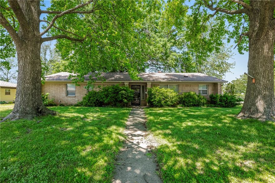LOCATION! Can you imagine having Bentonville's Orchards Park in your backyard?
Look no further! This 3bdrm, 2 bath home sitting on a corner lot , being sold As-Is is a blank 
canvas to remodel or fix up to call home or offer as Bentonville's next AirBnB! Two large living 
rooms, sun room, covered, enclosed patio & 2car garage are a bonus. Relax in the shade under the 
large pinoak tree or bike/walk/run on the nearby Greenway for miles.  Downtown Bentonville (1.1 
miles), Crystal Bridges (0.9 miles), The Amazeum (0.7 miles) & Coler Creek (4.7 miles) Wal-Mart Home Office (2.1 miles)