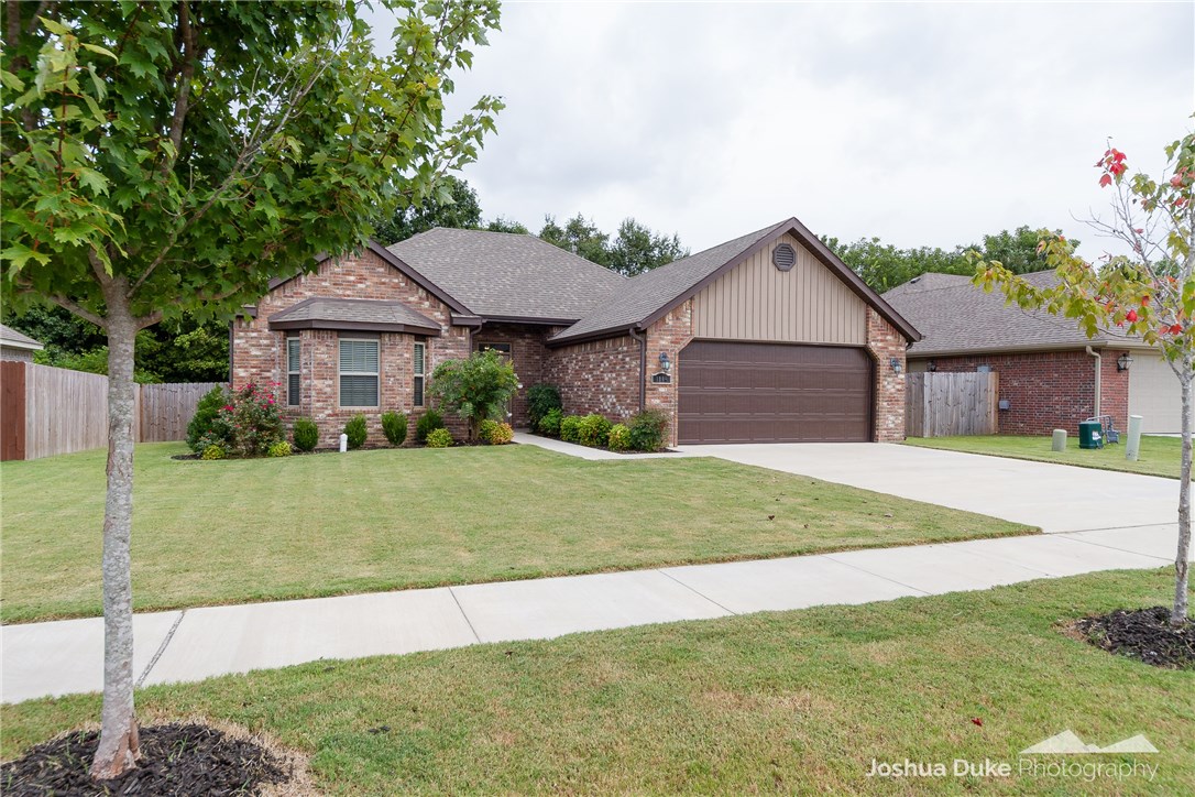 Cutest home that Southeast Fayetteville has to offer!! Enjoy 1,607 heated sq ft, 3 bedrooms, 2 baths in a split floorplan, an oversized living room with a corner fireplace and gas logs, kitchen offers a large island and SS appliances. Many upgrades in this 2014 built home!! Don’t miss the granite counter tops, epoxied garage floors, custom light fixtures, gray painted kitchen cabinets, and brass hardware. A wonderful partially covered patio is in the privacy fenced back yard that backs up to woods! Truly a doll house!! Zoned for Happy Hollow school district