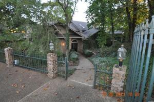 Large Home on 3 Acres. This home has endless possibilities. 300 feet on the Lake Shoreline, Great home for entertaining with all the room you will ever need. Custom made cabinets and custom woodwork throughout the house. The 4 car garage with full length work shop under the garage. 6182 square Feet does not include partially finished basement Boat Dock, Swimming Pool on the property with Golf course in the subdivision.