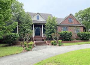 Big and beautiful best describes this stately home in one of Russellville's nicest neighborhoods. Conveniently located close to shopping and medical offices on a huge lot with sprinkler system and circle drive. A 3 car garage with built in cabinetry and covered back porch are yours at this great location! If you're looking for a home with 4BR 3.5 BA a chef's kitchen, beautiful hardwood floors, and great moldings...this could be the one!