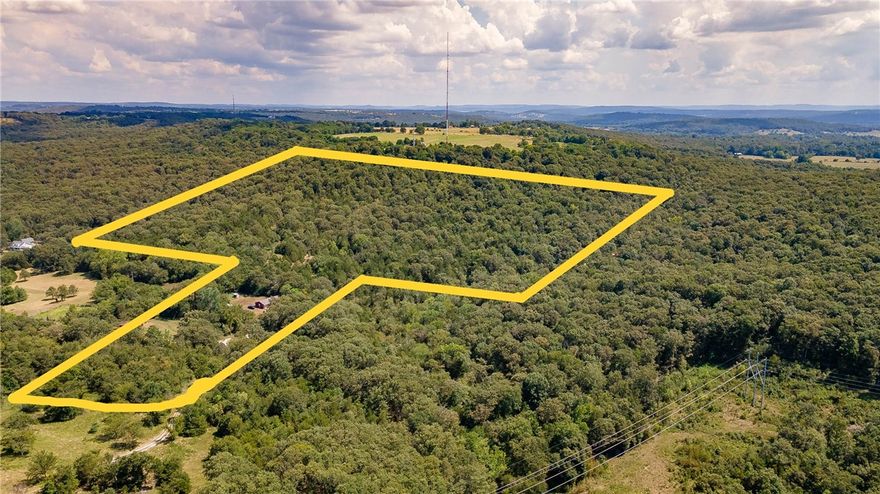 40.5± Acres Near Beaver Lake – Your Country Retreat Close to Goshen & FayettevilleEscape to 40.5± acres of serene countryside just minutes from Beaver Lake and the town of Goshen. With rural water and electric available, this property offers the perfect setting for a private home, a recreational retreat, or a combination of both.Enjoy the peace and privacy of wide-open spaces with room to build, explore, and even hunt on your own land. Yet you’ll remain conveniently close to Fayetteville, schools, and local amenities—perfectly blending country charm with modern convenience.This is more than land; it’s a canvas for the lifestyle you’ve always wanted. 2 bedroom 1 bath 1 car garage home on site being sold as is but welcome to inspect. Sellers will not be making repairs. You could live here while building your dream home or use as a rental. Also listed as MLS 1318990 a 2.65 acre lot MLS 1318997 a 35 acre lot MLS 1319008 a 3 acre lot with th home