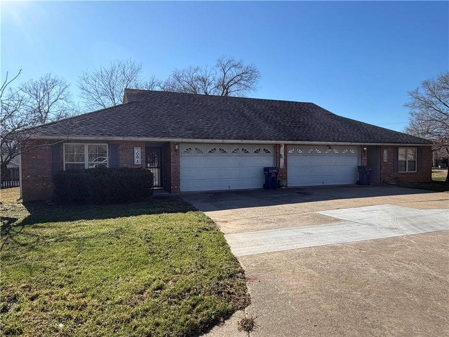 Don't miss the rare opportunity to lease this spacious 3 BR, 2 Bath duplex with two-car garage. It is one of the only duplexes in the neighborhood with a 2-car garage. This duplex includes all kitchen appliances, and a washer and dryer. Featuring fresh paint and light fixtures, and a beautiful brick accent wall in the dining room. Enjoy plenty of natural light with large windows throughout. Another great feature is the separate laundry and office area adjacent to the kitchen.This central location is just a short drive to schools, Walmart, and downtown Siloam Springs, and close to the Dogwood Springs Trail. Call today to schedule a tour.