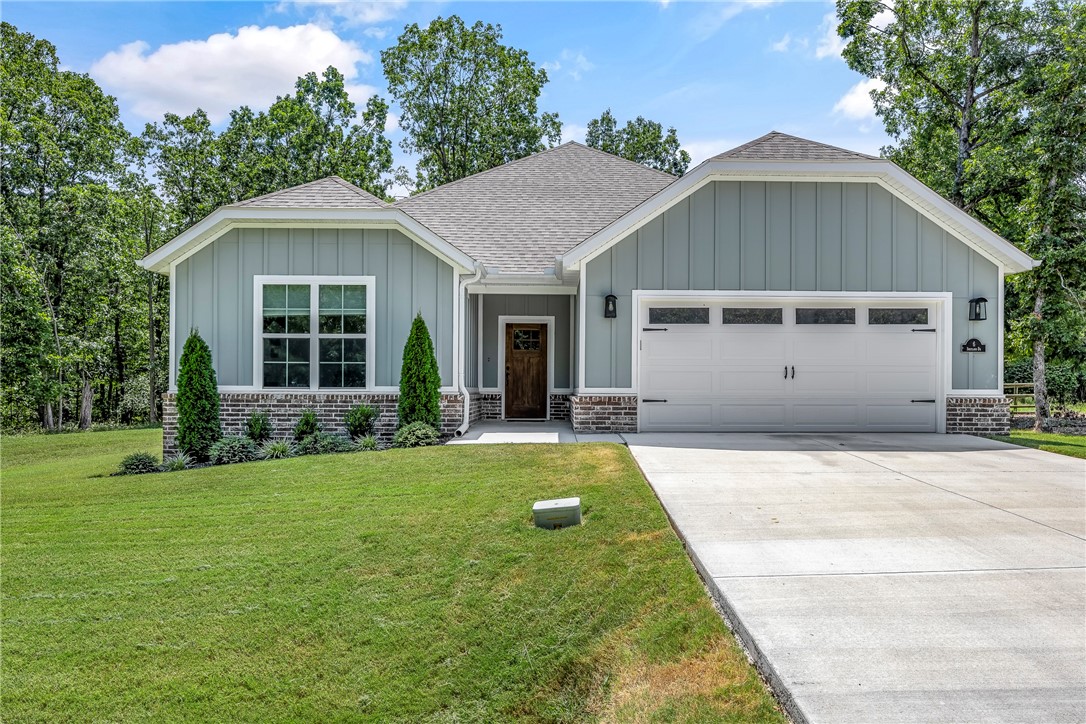 Built in 2024, this home sits on .29 acre lot minutes from I49 for easy daily commute. Home features; 2 Bedroom, Office / Bonus flex space, 2 Bathroom, open floor plan, upgraded light fixtures, & deck. Eat-in kitchen w/ double stainless sink, shaker style cabinets, granite countertops, tile back splash, microwave, & giant walk-in pantry. Living Room w/ gas log fireplace & vaulted ceilings. Primary suite features double sink w/ full mirror, walk in shower, & walk-in closet. Vinyl & Brick maintenance free exterior. Flat yard backs up to POA common / wooded property. Close to Highlands Golf Course, Loch Lomond, Branchwood Activity Center, and I49 for easy daily commute.