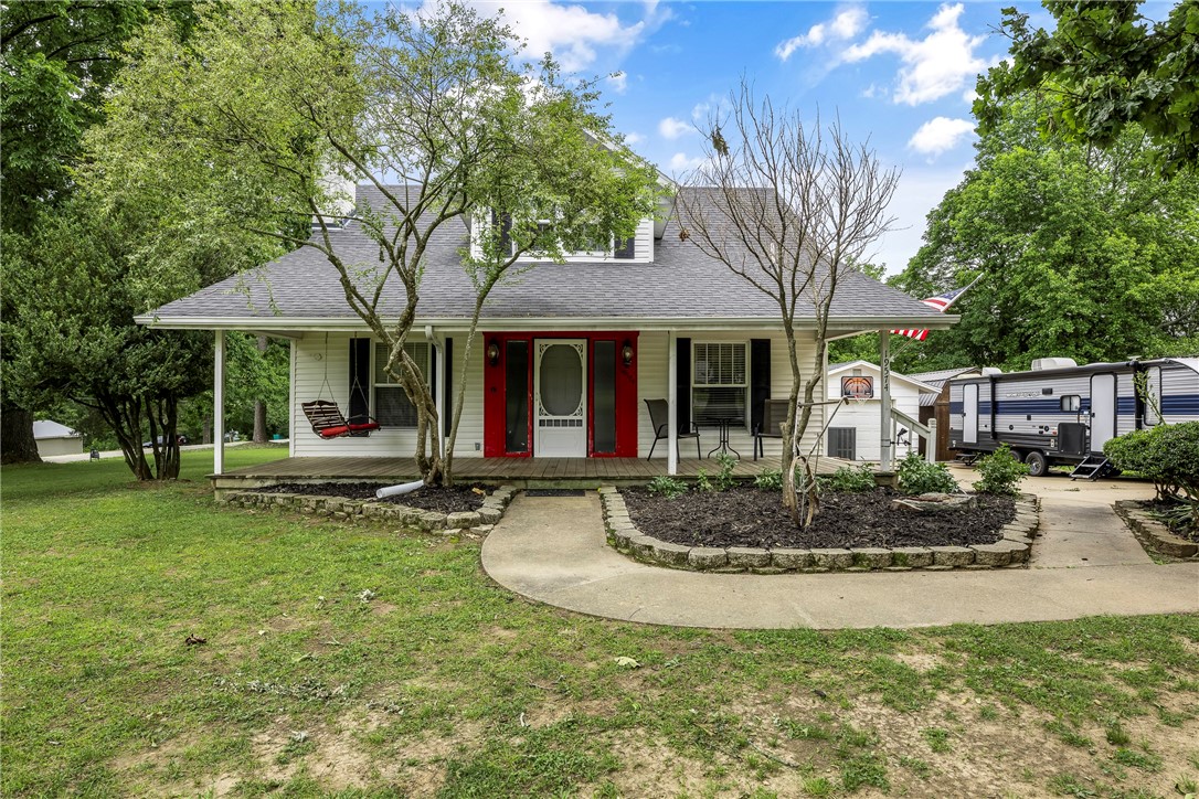 **BACK ON THE MARKET DUE TO NO FAULT OF THE SELLER** Welcome home to this charming 3 bedroom, 3 bath farmhouse, a hidden gem on 1.25 acres. Built in 1937, this unique property displays character and warmth. With multiple bedrooms and bathrooms, this home provides plenty of room for family and guests, gun safe room off primary bedroom. The expansive outdoor space offers endless possibilities—whether you envision a flourishing garden, relaxing on the front porch, space for outdoor entertainment, or hunting, the potential is limitless - even an RV hookup, chicken coop and extra storage shed. Updates include new paint in living area, new HVAC (2025) new hot water heater installed (2025) Roof (2020) electrical/plumbing (2020). This home is conveniently close to local amenities and school and less than a mile to the White River; this old farmhouse is a rare find with the peacefulness of country living. Don’t miss your chance to make this home yours! Seller prefers to sell house "as is."