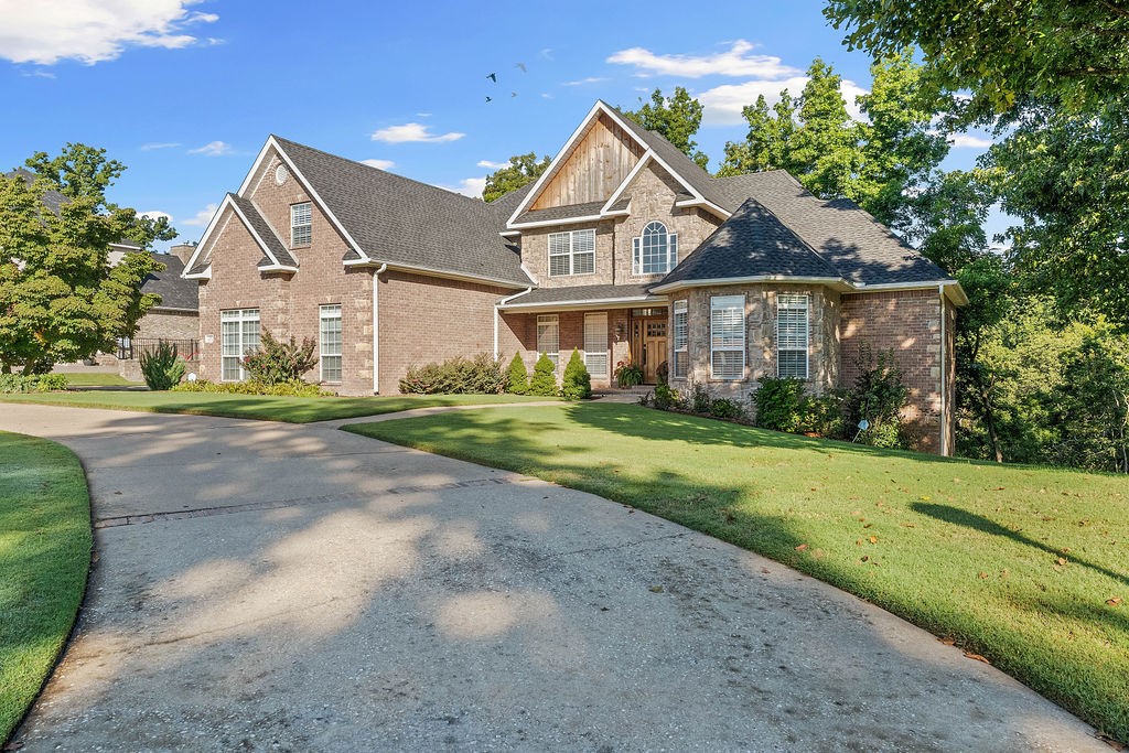 Amazing North Bentonville Location!!! Near walking and mountain biking trails with quick access to I-49! This spacious 5-bedroom home offers room for everyone. Enjoy two large living areas plus a game room, perfect for entertaining or spreading out. The home also features two dedicated offices/studies, a formal dining room, and a beautifully remodeled chef’s kitchen with custom built-ins and a large eat-in area. Step outside to a two-level deck designed for outdoor relaxation and gatherings. A circular drive and lush landscaping enhance the curb appeal. The luxurious master suite includes a cozy fireplace, sitting area, and a remodeled bath for your private retreat.