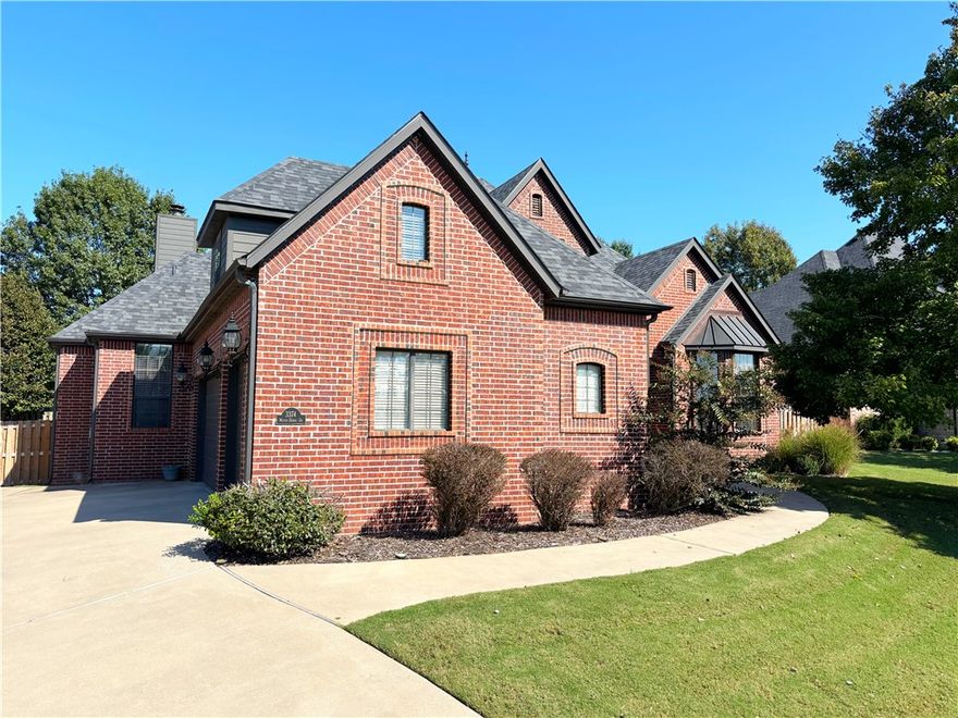 Come home to this Fayetteville stunner! Located in desirable Copper Creek subdivision. This home has it all. 4/5 bedrooms and 3 1/2 bathrooms with a powder room downstairs. Huge bonus room could easily be considered for 5th bedroom. Inviting formal dining and eat in kitchen, vaulted ceilings, wood burning fireplace, two family rooms, office and large primary bedroom downstairs, jacuzzi tub and large walk in closet. Granite counters, gas cooking range, tile and wood flooring throughout. Beautiful landscaped yard with extended patio and pergola in backyard, great for entertaining. Copper Creek subdivision is in a prime NWA location, connected to greenway bike trail, botanical gardens and Lake Fayetteville. Neighborhood amenities include community pool, tennis, pickle, and basketball courts. Location provides quick access to I-49, FAC and NWA mall. Brand new roof and owner is offering a 1 year home warranty. Schedule your showing today!