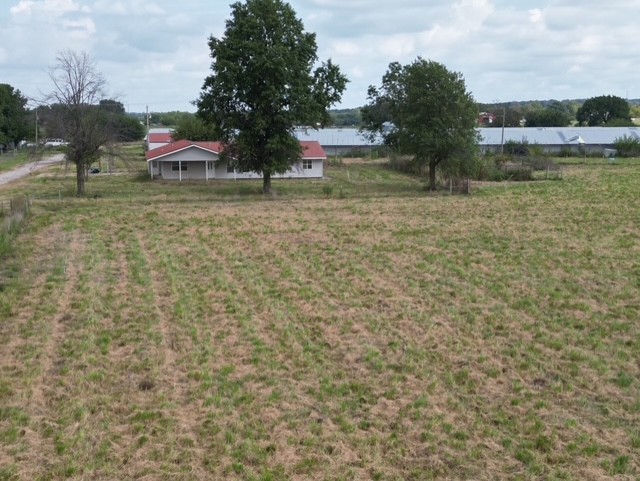 This unique property offers a rare opportunity to own 20 acres in a peaceful country setting, featuring a spacious home, multiple outbuildings, and open land with endless potential. Formerly a working chicken farm, the property is now bank-owned and being sold as-is, making it an excellent investment for buyers seeking space, privacy, and room to create their vision.