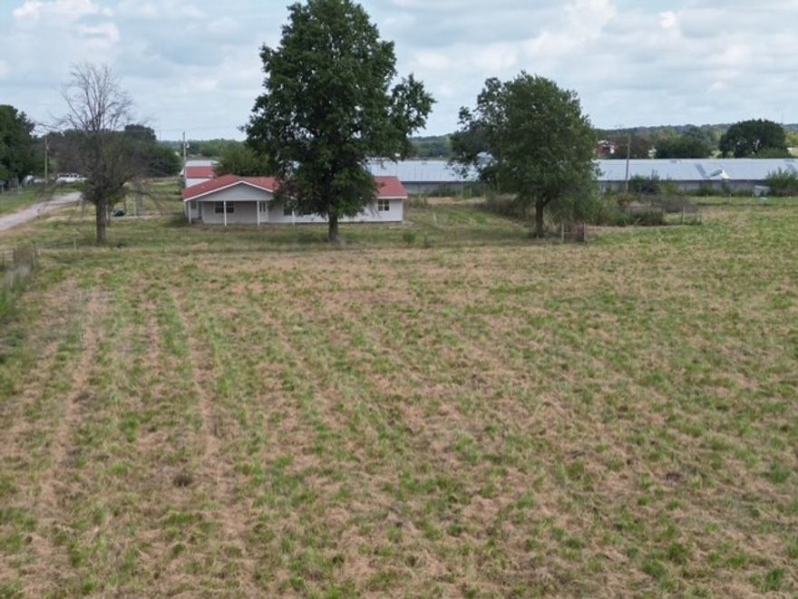 This unique property offers a rare opportunity to own 20 acres in a peaceful country setting, featuring a spacious home, multiple outbuildings, and open land with endless potential. Formerly a working chicken farm, the property is now bank-owned and being sold as-is, making it an excellent investment for buyers seeking space, privacy, and room to create their vision.