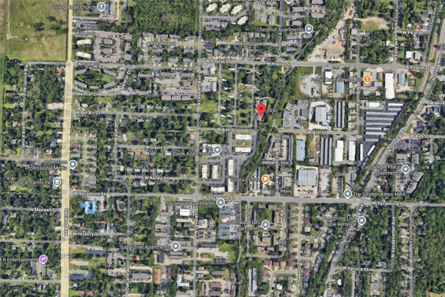 Welcome home to this well-located condo just minutes from the University of Arkansas and all things Fayetteville. Step outside your door and hop directly onto the Razorback Greenway located behind the property—perfect for morning runs, bike rides, or an easy connection to campus and downtown. Inside, the home features durable vinyl flooring, 3 bedrooms, 2 full bathrooms, and a convenient half bath, offering a functional layout for everyday living or rental use. A private one-car garage adds valuable storage and parking convenience. This property has operated as a VRBO for over three years, making it an excellent option for investors, students, or anyone seeking a low-maintenance lifestyle close to the U of A. Any furnishings may be negotiable for purchase, & the refrigerator, washer, & dryer may convey with an acceptable offer. May qualify for FHA or other loan options, subject to lender approval.